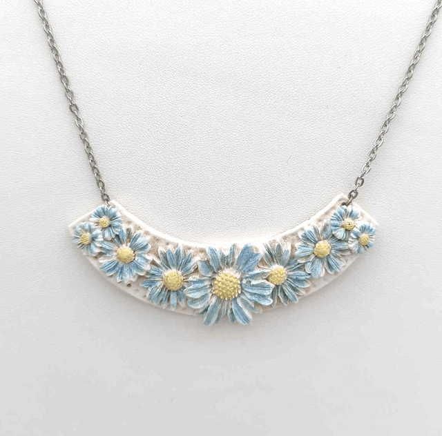 Collier en porcelaine froide Marguerites 